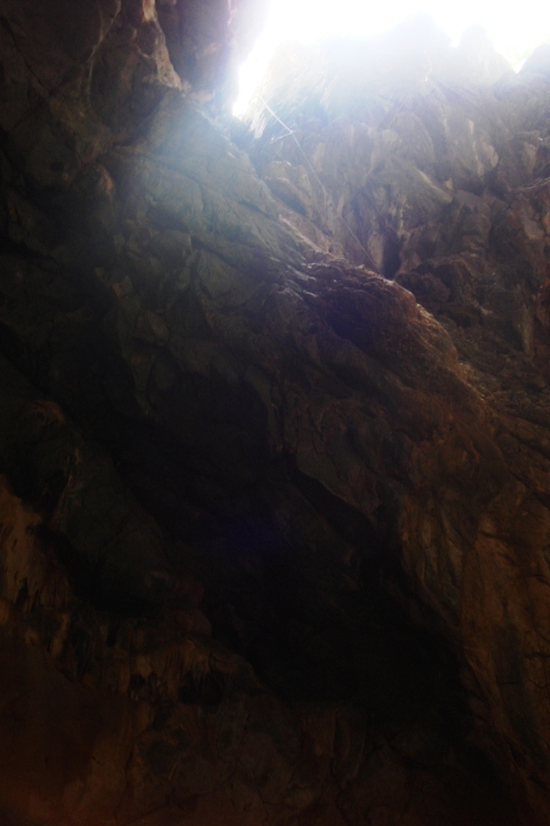 Rappelling 180 feet into cave